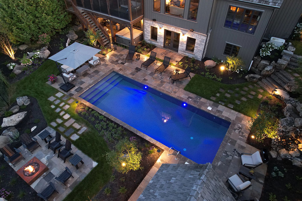 18 by 36 rectangle pool in a finished Minnesota backyard